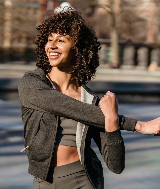 Various people enjoying morning exercise and wellness